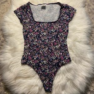 Pink Victoria’s Secret Floral Bodysuit Size XS